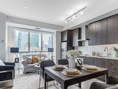 Executive Skyline Condo w/ Free Parking, Gym