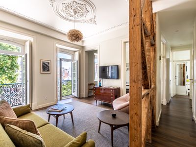 Marble, Molding, and Timber Frames at a Stylish City Retreat