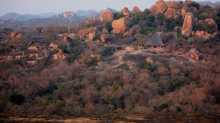 Main view of Big Cave Camp, "Lodge on the Rocks" - Big Cave Camp reposes atop an enormous granite ridge, with stupendous views into the National Park