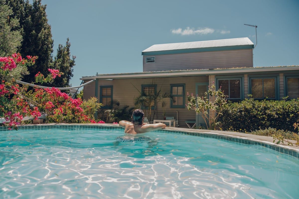 Coastal Tranquility with Lush Garden & Pool gallery image 4