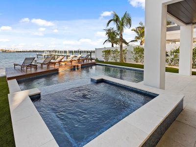 Waterfront Luxury Pool Home, Golf Cart, and Bikes!