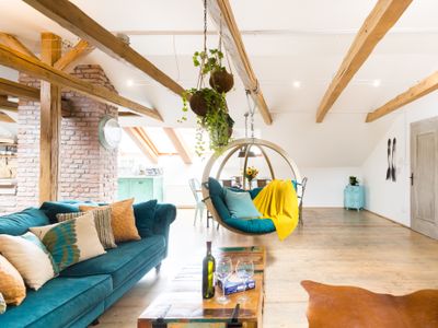 Chill in a Hanging Chair at an Old Town Bohemian Loft