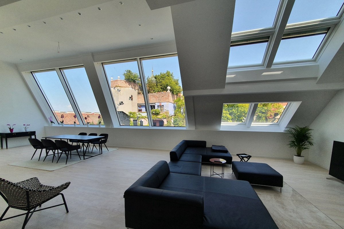 180m2 luxury rooftop in front of Hundertwasserhaus gallery image 2