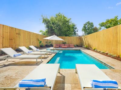 Modern Urban Oasis w/ Heated Pool, Patio & Parking