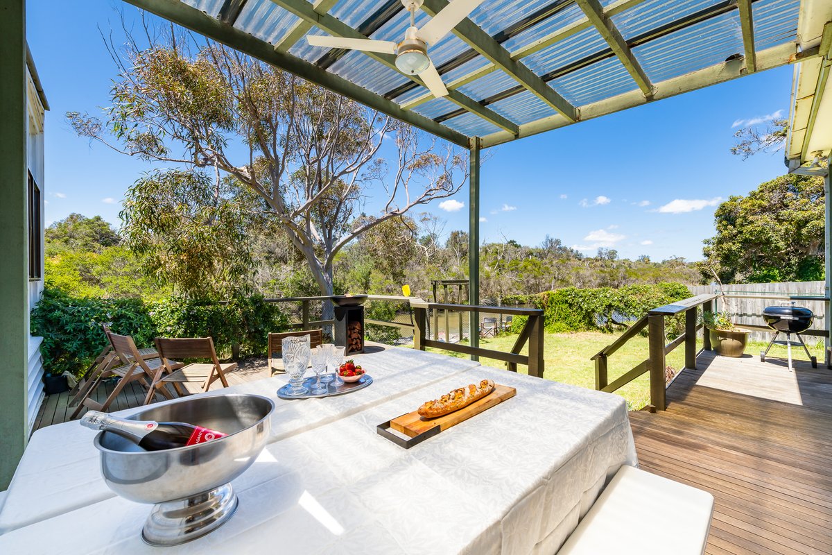 Spacious riverfront beach house getaway