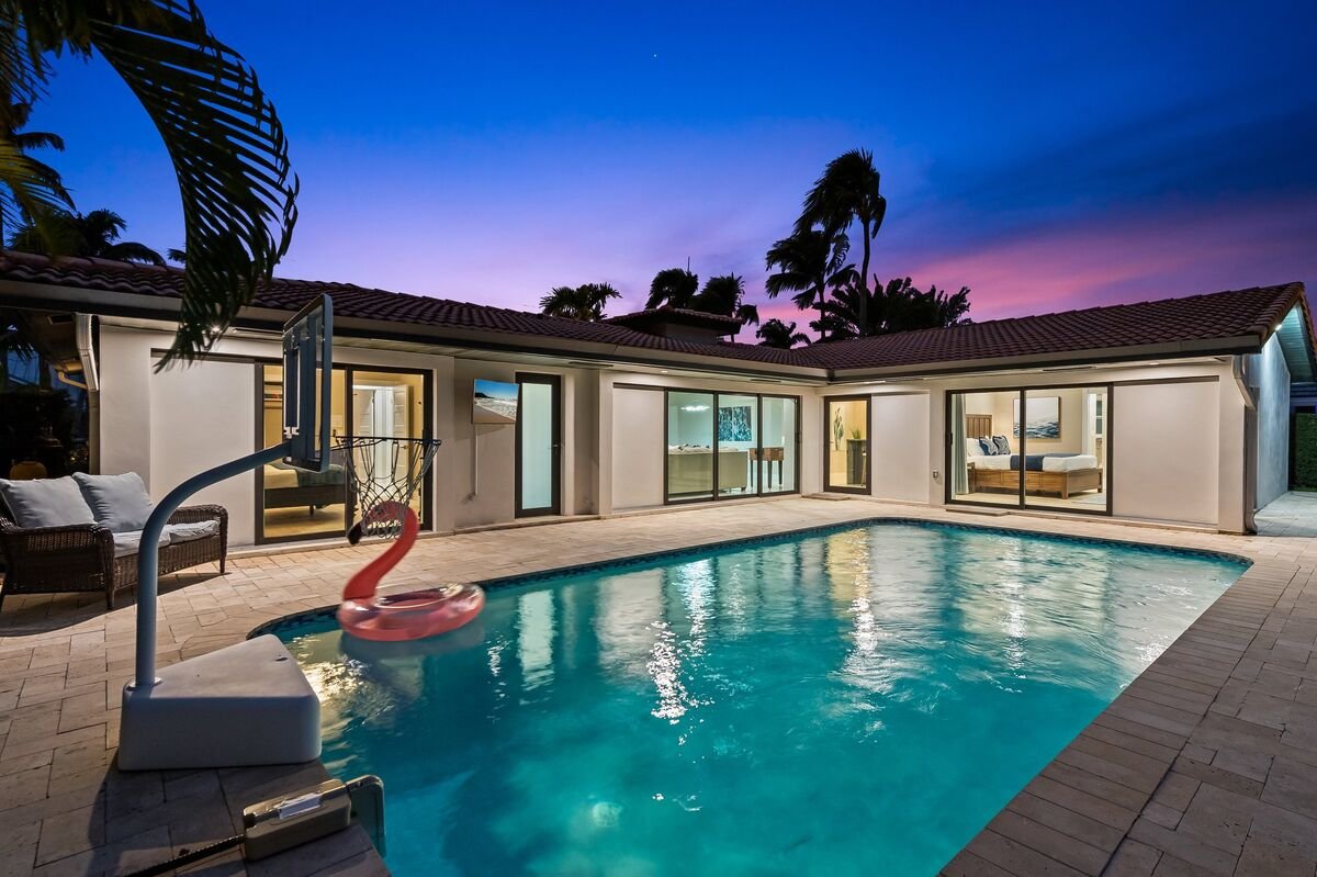 HUGE Heated Pool~Waterfront~BIG Patio + Dock gallery image 2