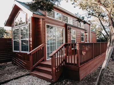 2 cabins together in tiny home resort with pool!