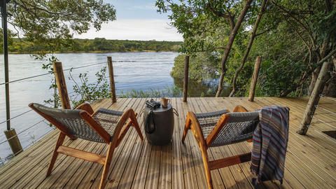 River deck tent view - River deck tent with deck over the river