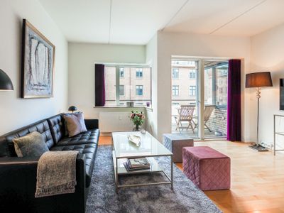 Explore the Tivoli Gardens from a City Center Apartment