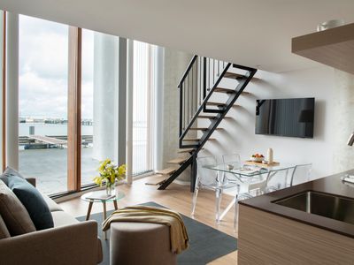 Stylish Riverfront Apartment with Stunning Views