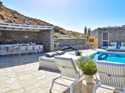 Luxurious villa with a pool, sea and sunset view