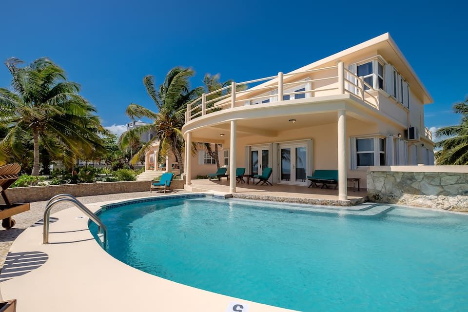 Spacious 2 Story Beachfront Home + Pool, Caretaker gallery image 2