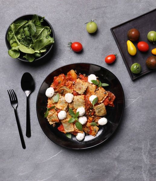 Photo of RAVIOLI AL POMODORO