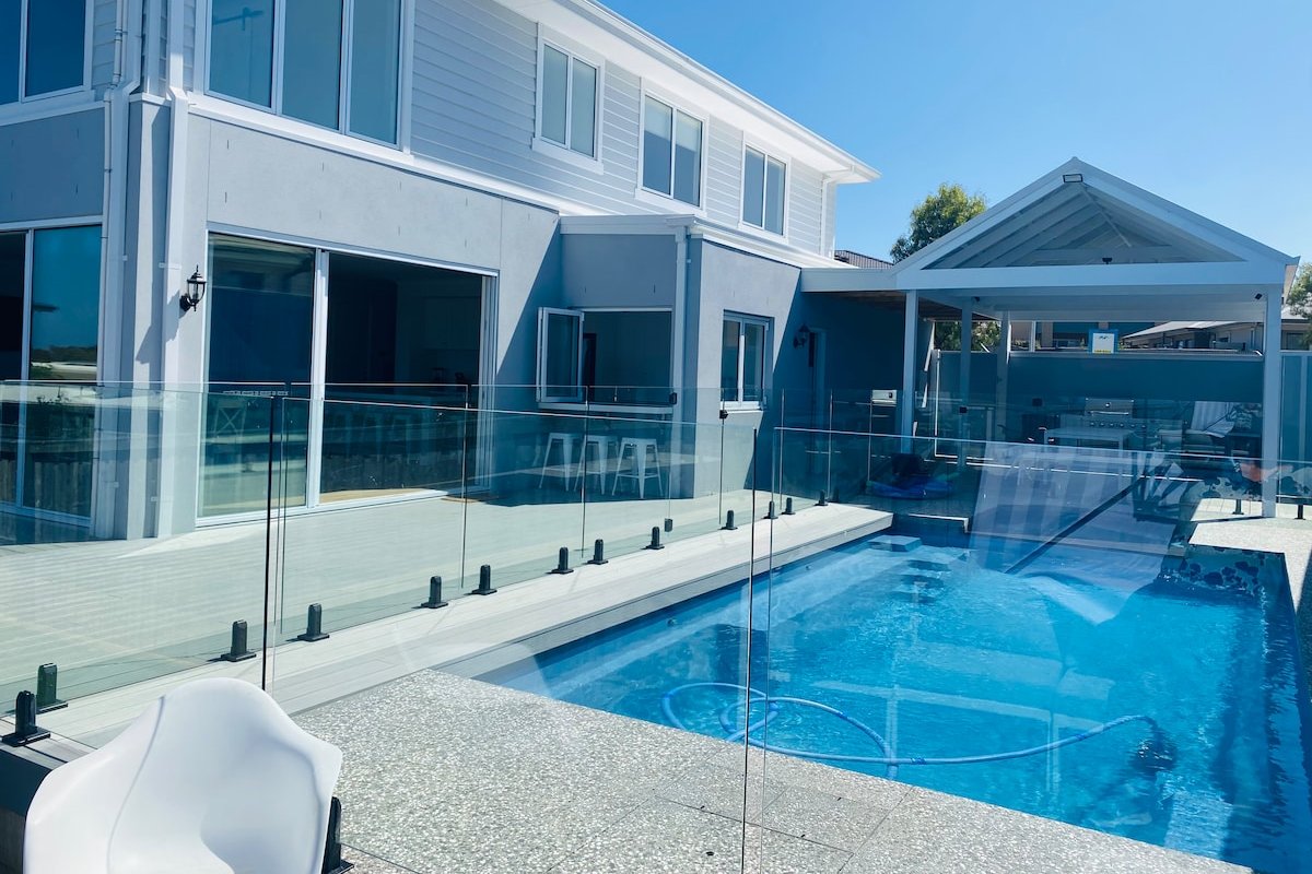 Sun-drenched brand new family home with pool gallery image 3