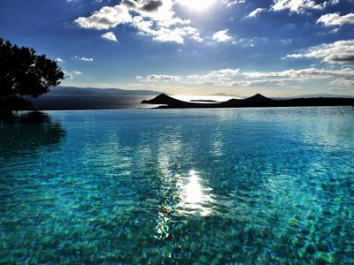 Gorgeous pool villa, stunning sea views, helipad!