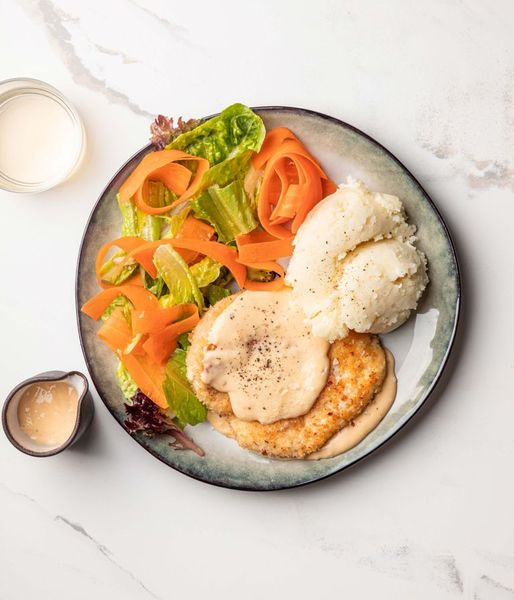 Photo of Chicken Schnitty & Cheese Sauce