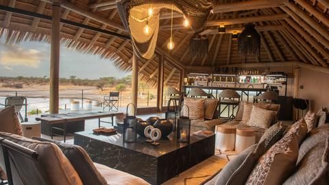 Onguma Camp Kala - Onguma Camp Kala lounge overlooking the waterhole