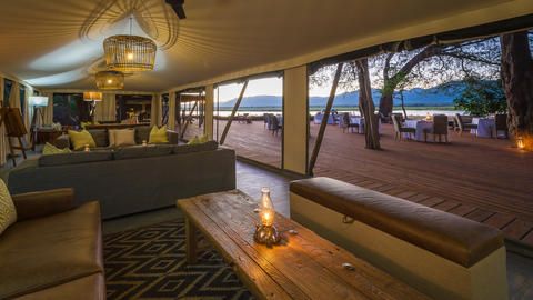 Wilderness Ruckomechi - Guest lounge area and adjacent al fresco dining area