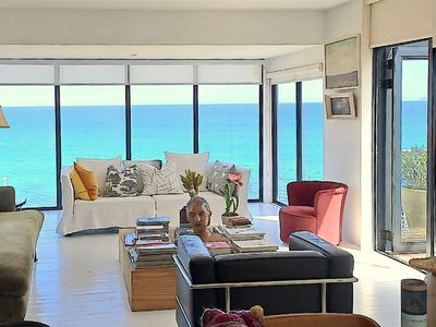 Contemporary beach house with elevated sea views.