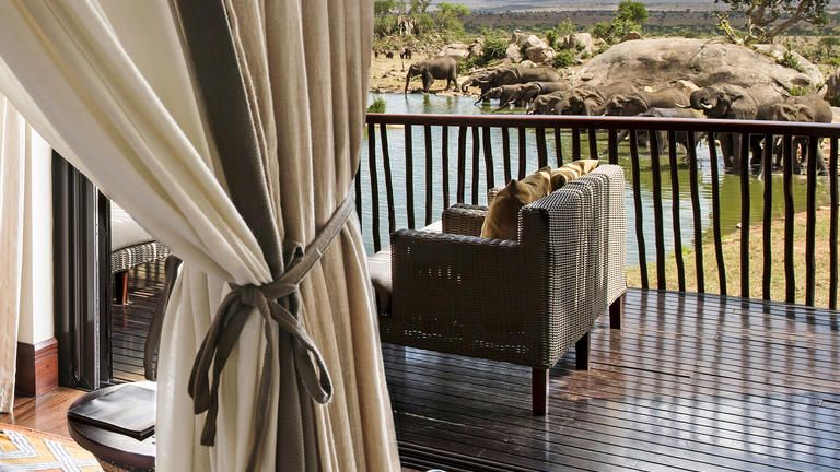 Four Seasons Safari Lodge Serengeti SAVANNAH ROOM WATER HOLE VIEW