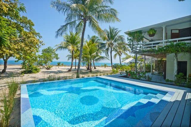 Beachfront w/pool, firepit, family getaway. gallery image 5