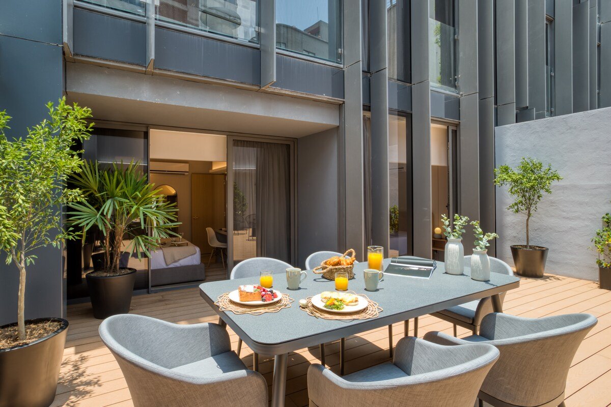 Iconic Apt w/Private Patio | Rooftop+Gym+B/Center gallery image 3