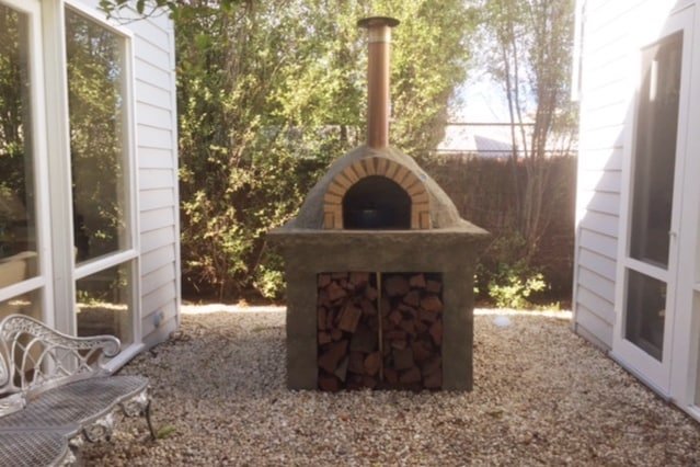 Pavilion House – Tennis court, Pizza oven gallery image 5