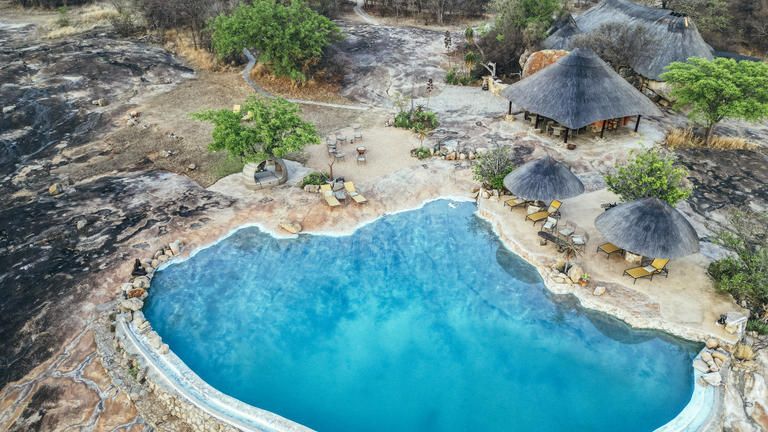 Infinity Rock Pool - The beautiful infinity pool, carved into the granite rock offers you the opportunity to relax & refresh in its cool waters or on the comfortable sunbeds, with breathtaking views over the Matobo Hills and the waterhole below.  Situated next to the sunset lounge, which holds the safari spa where guests can pamper themselves with a range of treatments from full body massages to facials, pedicures & manicures.