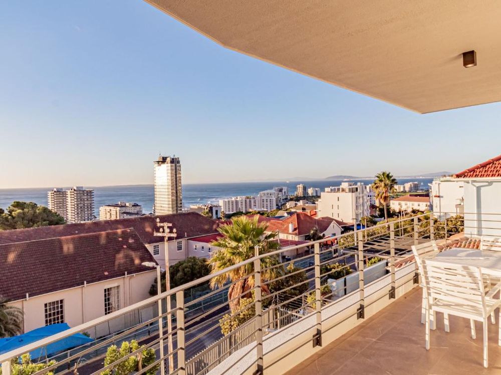 Alpha Sunsets - outside table with views