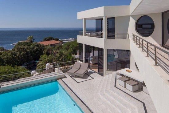 Photo 1 of 48 Sunset Avenue accommodation in Llandudno, Cape Town with 4 bedrooms and 3 bathrooms