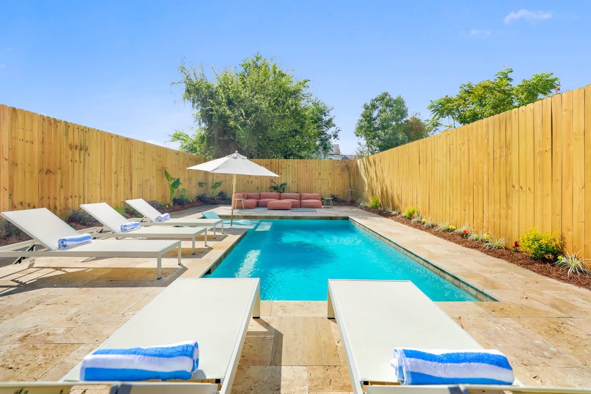 Modern Urban Oasis w/ Heated Pool, Patio & Parking