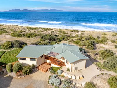 Secluded beach front retreat with a heated pool