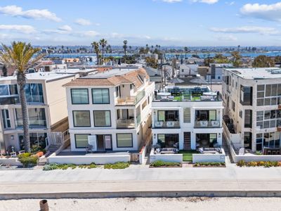 Luxury oceanfront fourplex with roof deck, sleeps
