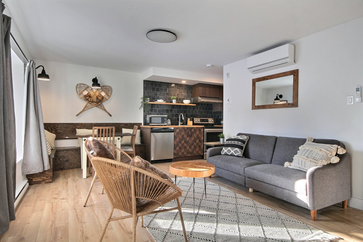 Unique and Sunny Top Floor Old Quebec Gem