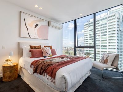 RARE 4BR Dual Apartment Escape Near Shrine & CBD