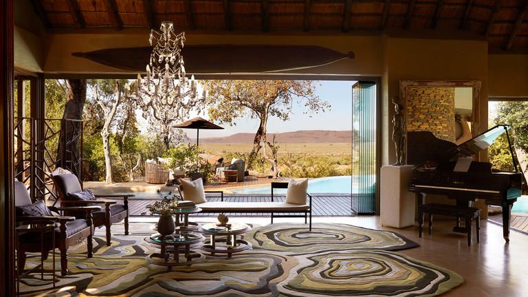 Molori Main Lodge Lounge - Magnificent views over the deck, pool and mountains
