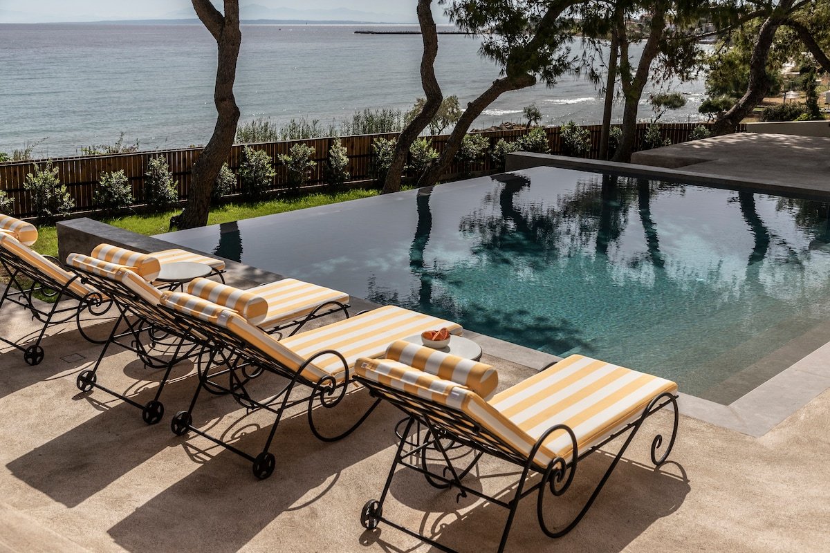 Bozonos Beachfront villa with Heated Pool