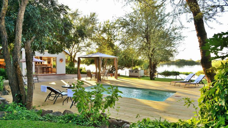 River View Lodge - Pool deck and bar overlooking the Chobe River.