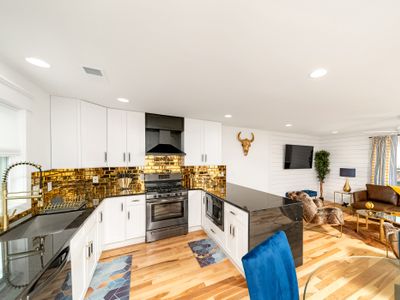 City Hideaway with Stunning Rooftop Escape #4