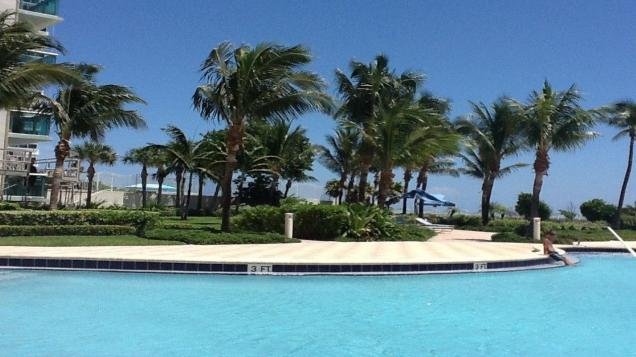 E Beautiful beachfront property with pool partia