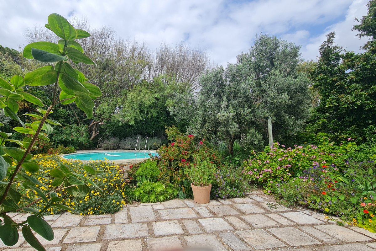 Coastal Tranquility with Lush Garden & Pool