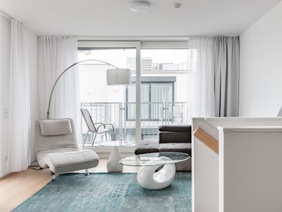 Soak up the Light at a White Penthouse near the Karlskirche