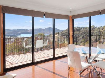 Modern, spacious & sunny home with stunning views.
