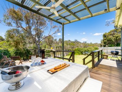 Spacious riverfront beach house getaway