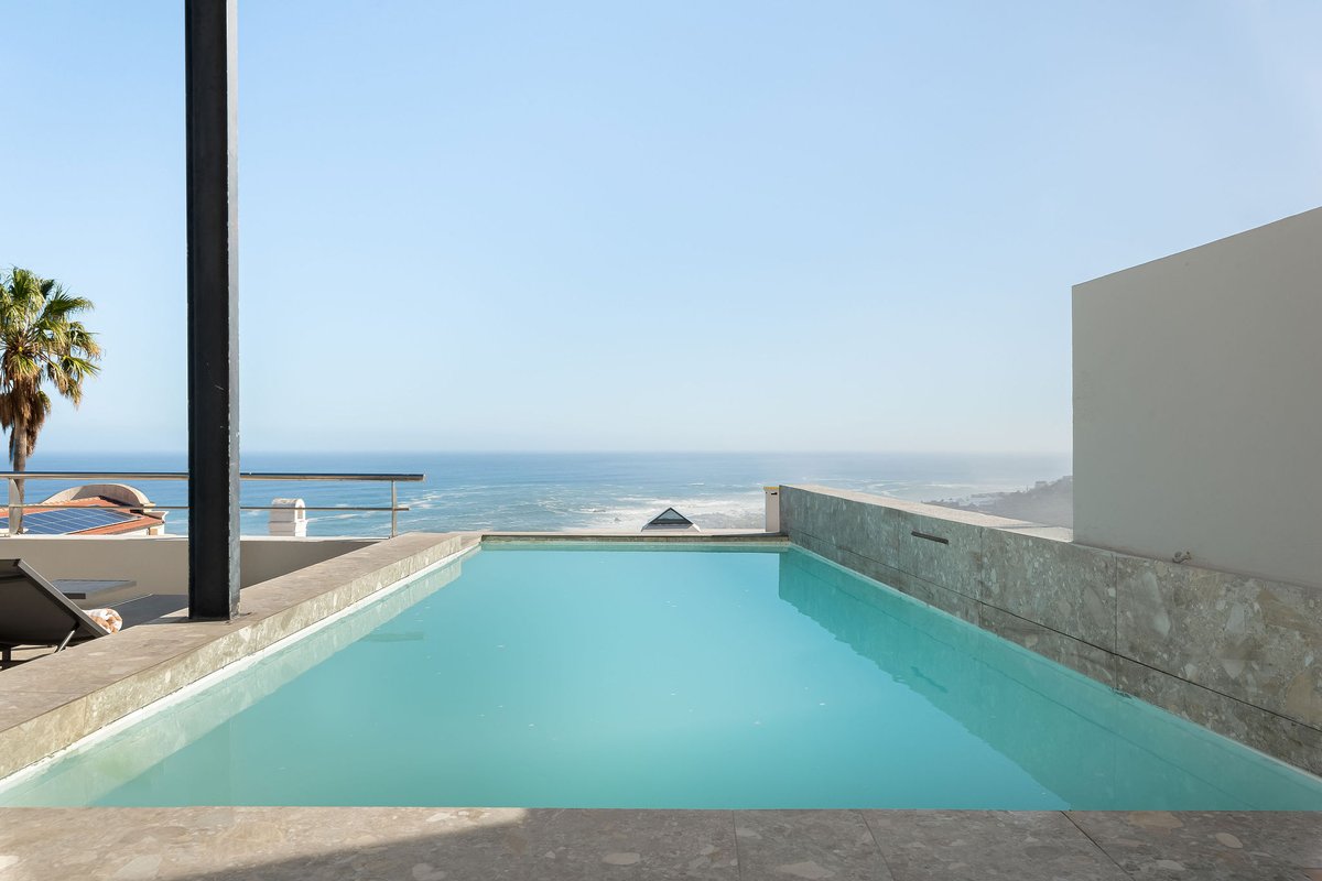 Renovated: Camps Bay Penthouse: pool, views