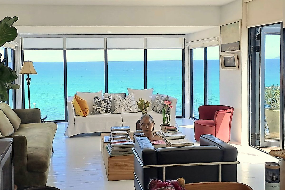 Contemporary beach house with elevated sea views.