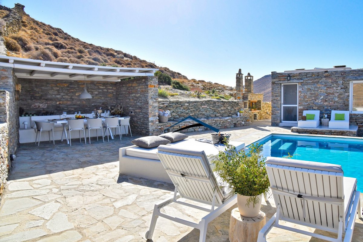 Luxurious villa with a pool, sea and sunset view