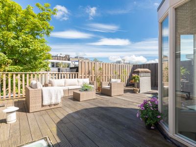 Large penthouse with roof terrace near Vondelpark
