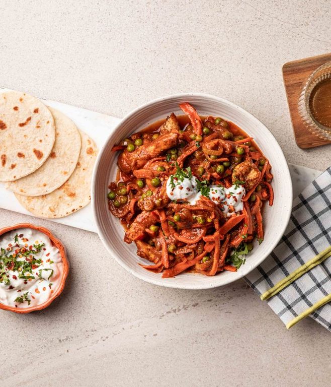 Photo of Saucy Indian-spiced Chicken