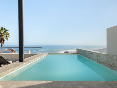 Renovated: Camps Bay Penthouse: pool, views
